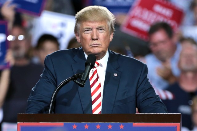 Donald Trump standing at a podium during his presidential campaign.