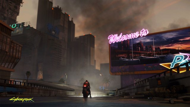 A person sits on a bike on a road outside a neon sign and a city in Cyberpunk 2077.