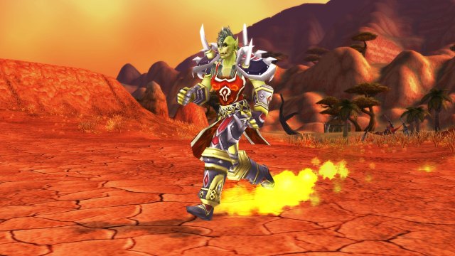 an orc warrior speeding across the desert