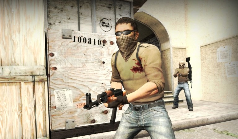 A CS:GO character holding an AK.