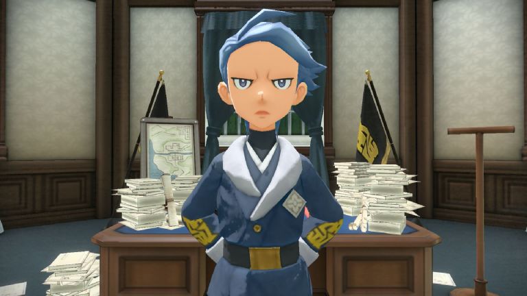 A man with short blue hair in Pokemon Legends: Arceus. He has a stern, professor-like look with his hands behind his back.