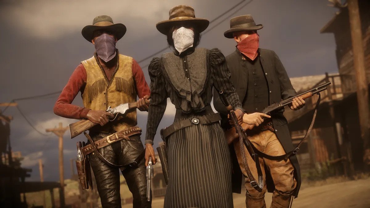 Three cowboys stand geared up walking down a street in Red Dead Redemption 2.