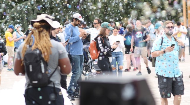 Pokemon Go players out playing the game together at an event.