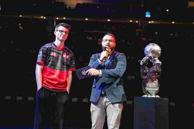 GarretG being interviewed on stage while playing for NRG