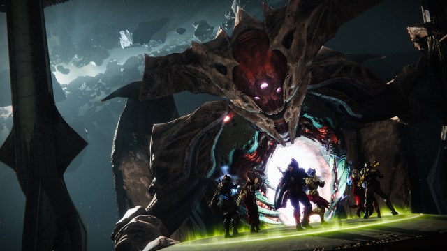 Taken King Oryx looms over a fireteam of guardians in Destiny 2.