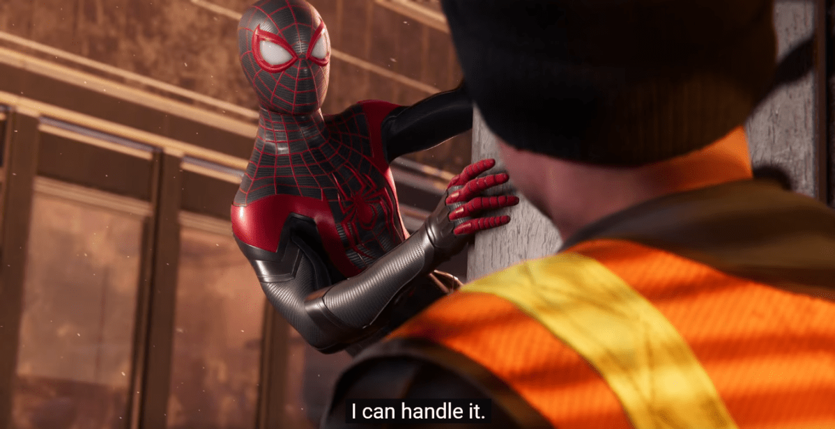 Miles Morales as Spider-Man clings to a wall and tells a contruction worker, "I can handle it."