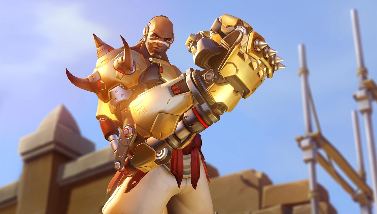 A screenshot of Doomfist holding up his big, golden fist. He is manly.