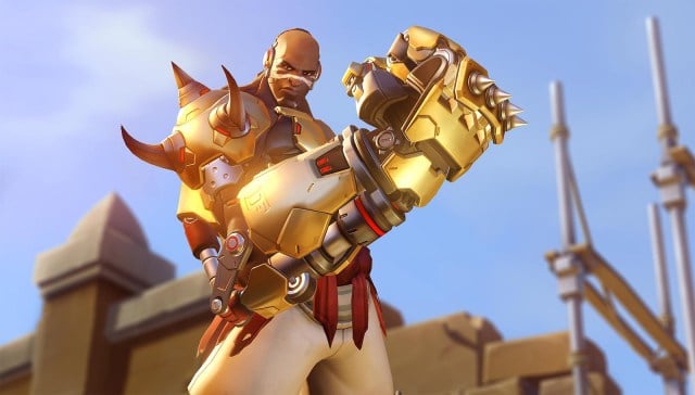 A screenshot of Doomfist holding up his big, golden fist. He is manly.