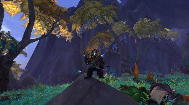 A dwarf hunter stands in combat stance in WoW Dragonflight.