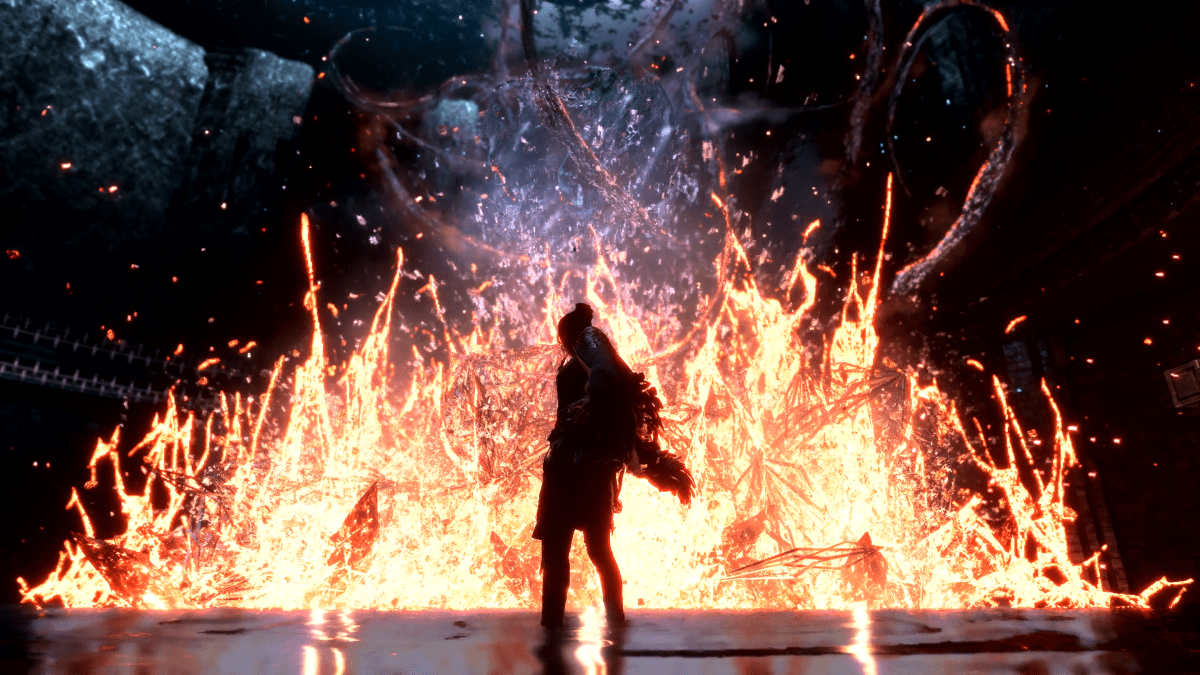 The main character of Forspoken stands in front of a wall of fire.