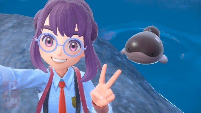 A Pokémon trainer from Scarlet and Violet takes a selfie with a Clodsire swimming in the background.