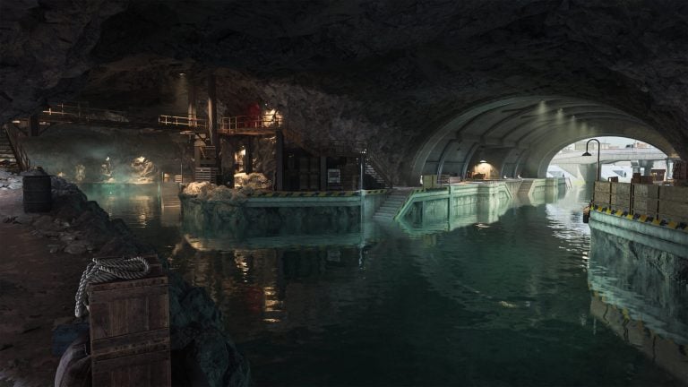 An underground cavern with aqua water, lit by electric lights on Ashika Island in DMZ.