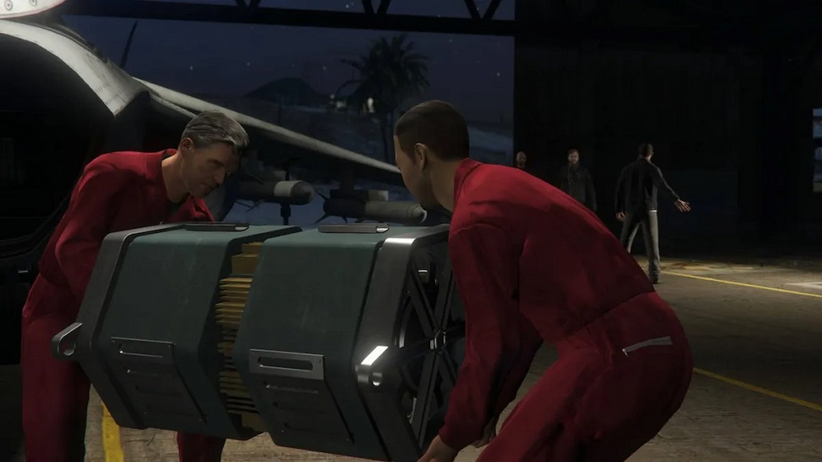 GTA Online two characters carrying a large case in an airplane hanger
