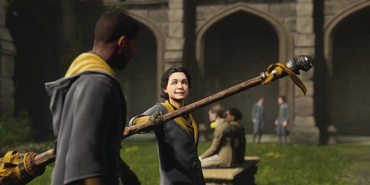 A student practicing with their broom.