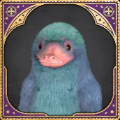 A platypus-like creature smiles for the camera in a yearbook-esque photo, showing readers exactly what a Niffler looks like