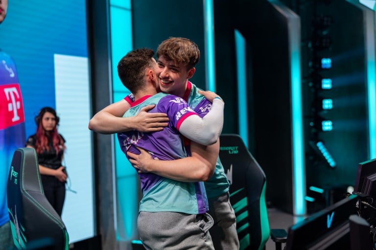 SK Gaming League players hug on state at the LEC.