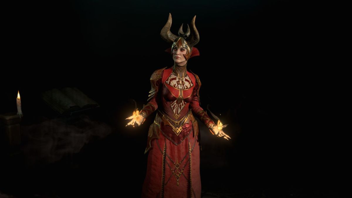 Diablo 4 Sorcerer class wielding small flames in her hands.