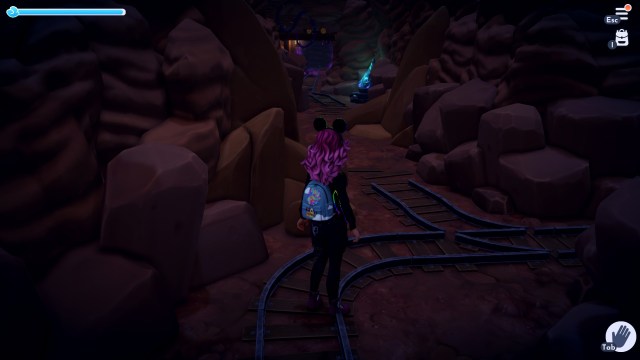 The player standing at a fork in the mines.