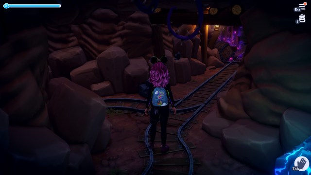 The player standing at a fork on the mines. 