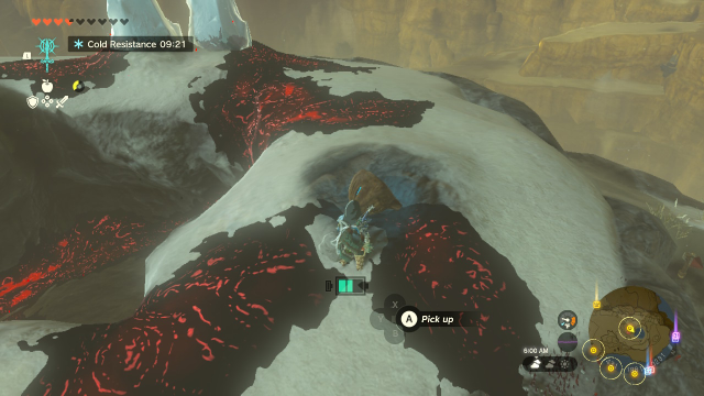 Link stands on an icy peak surrounded by crimson Gloom. In front of him is an eye-shaped chunk of stone.