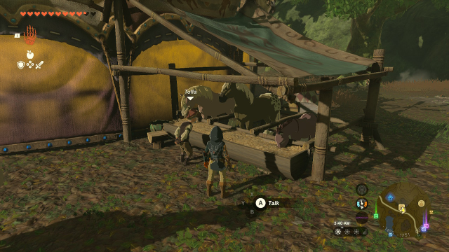 A screenshot of the stable and the stablehand and link in totk.