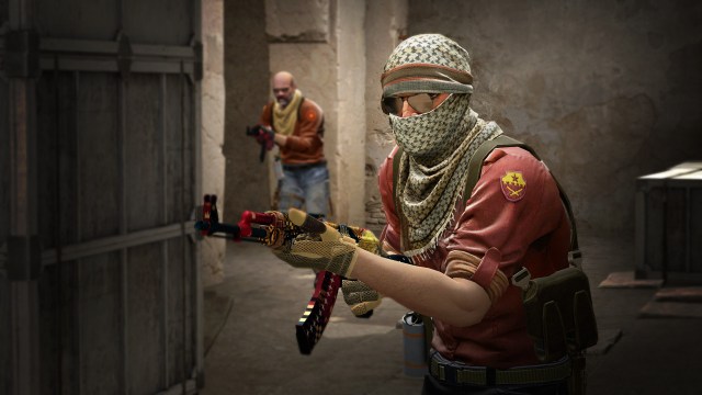 Two terrorists entering combat in CS:GO.