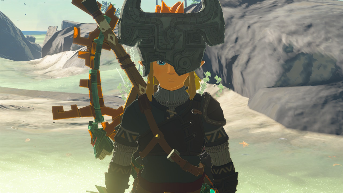 Link weats Midna's Helmet , a grey blocky helmet that covers half his face and has an orange ponytail, in TOTK