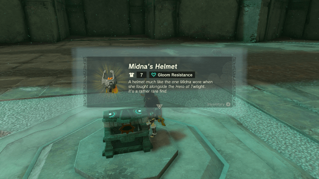 Link opens a treasure chest and a dialogue box pops up, showing Midna's Helmet.