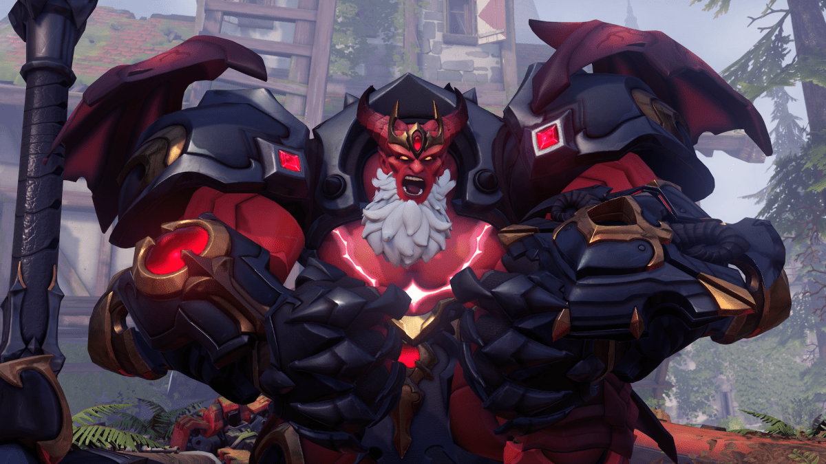 A closeup of Demon Lord Reinhardt flexing menacingly while yelling.