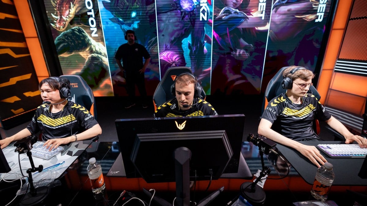 Vitality's Perkz, Bo, and Upset competing on stage in the 2023 LEC Summer Season.