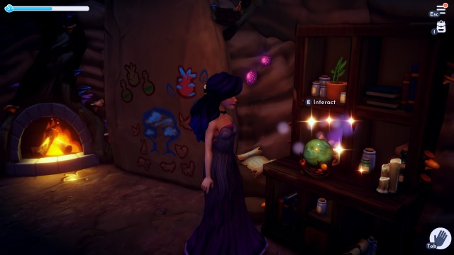 The player looking at the green crystal ball in the Vitalys Mines hidden room.