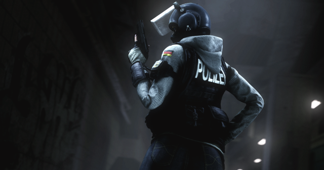 IQ holding a gun.