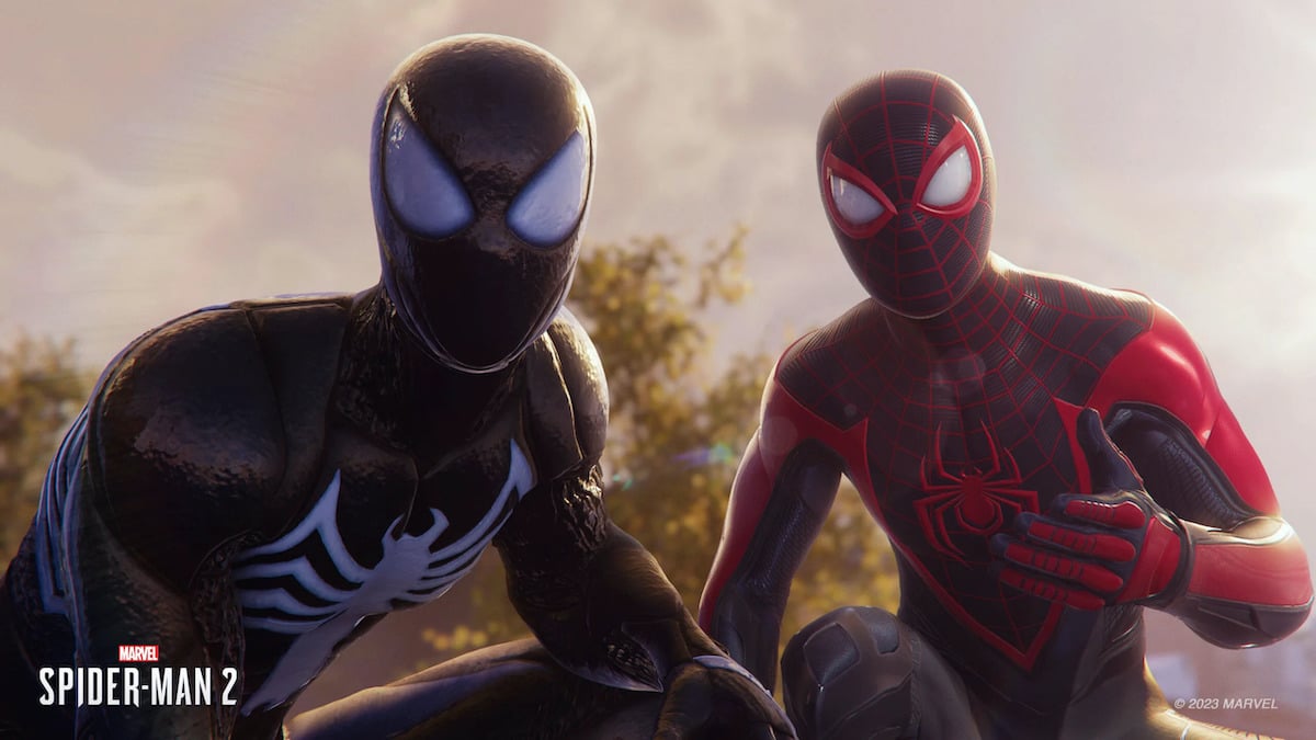 Peter Parker wearing the black Spider-Man suit next to Miles Morales