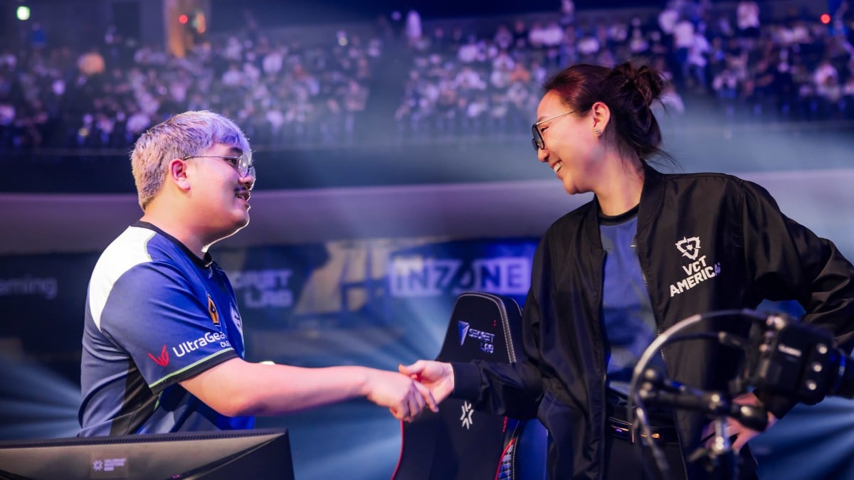 Alexander "jawgemo" Mor and coach Christine "potter" Chi of Evil Geniuses are seen after victory against Team Liquid at VALORANT Masters Tokyo.