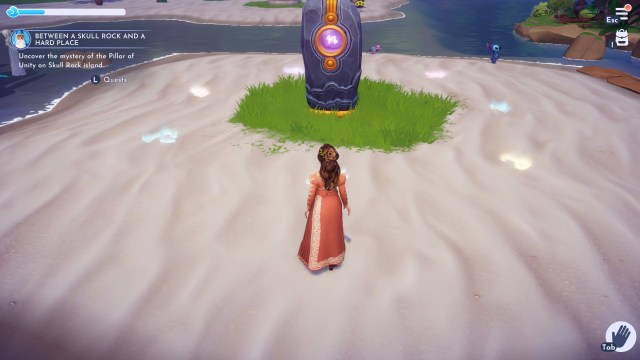 The player standing by the symbols around the Pillar of Unity. 