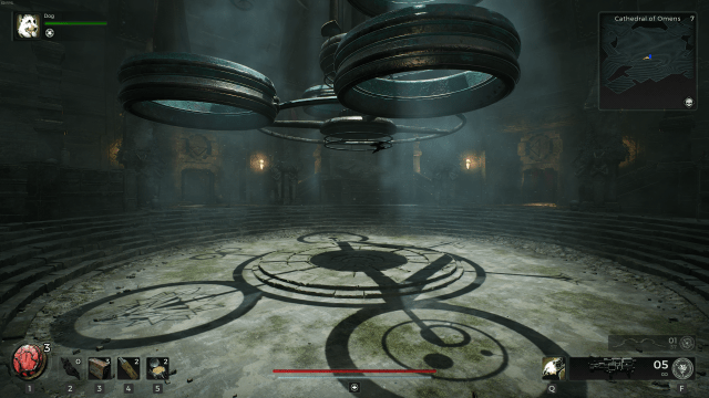 Screenshot from Remnant 2 showing a device with multiple circular structures hangs from the ceiling of n abandoned temple. On the ground beneath it are shadows of symbols and circles.