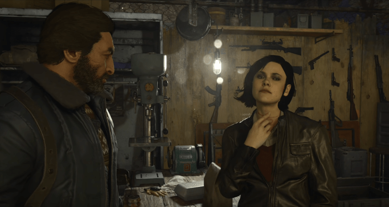 Female Call of Duty: Black Ops Cold War character Park speaking to male character Lazar in a depot with several guns.