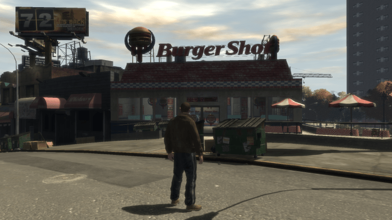 GTA IV protagonist Niko about to enter a Burger Shot store in Bohan.