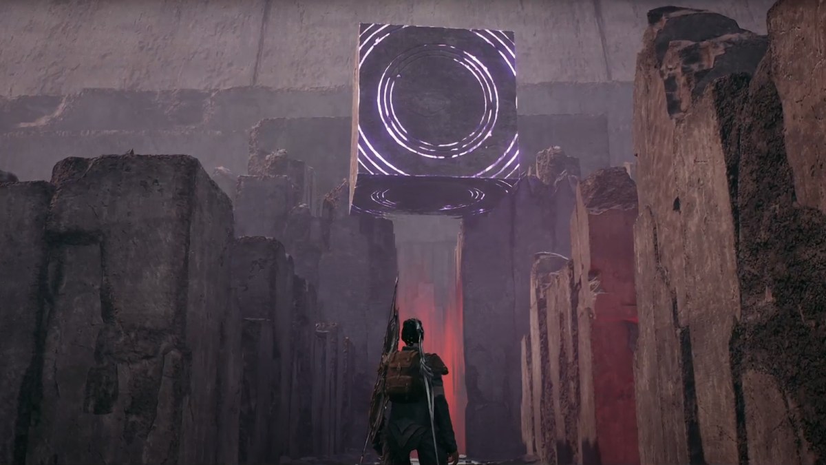 The player facing the Labyrinth Sentinel, a glowing purple cube on a tower in Remnant 2.