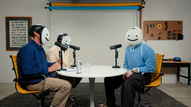 Dream, Colin, and Samir all wearing the Dream smile mask and talking during an interview. 