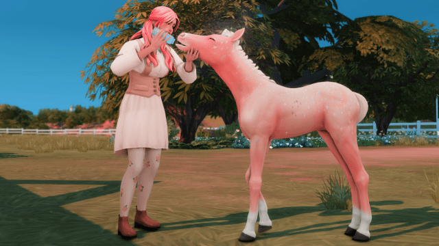 A sim feeding a baby foal unicorn milk.