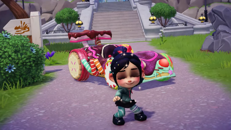 Vanellope dancing in front of her candy car in the valley.