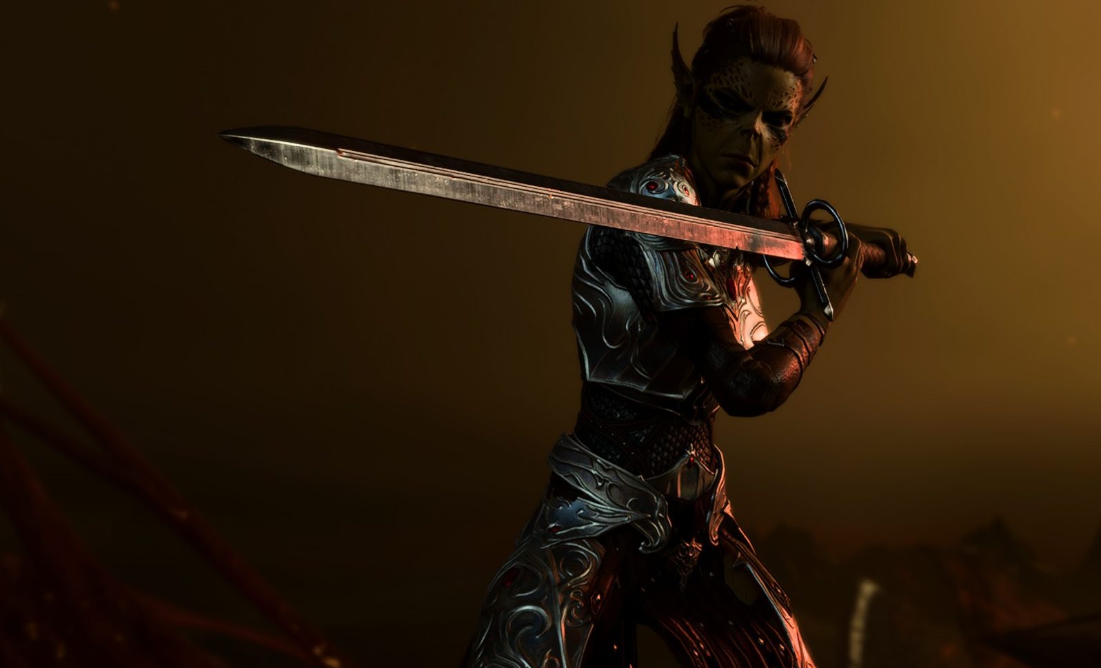 Lae'Zel holds a sword across her body, as she stands in a defensive pose.