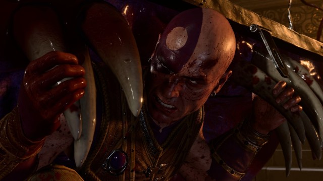 Minsc, a bald man and lovable compaion in BG3. In this picture he's covered in blood.