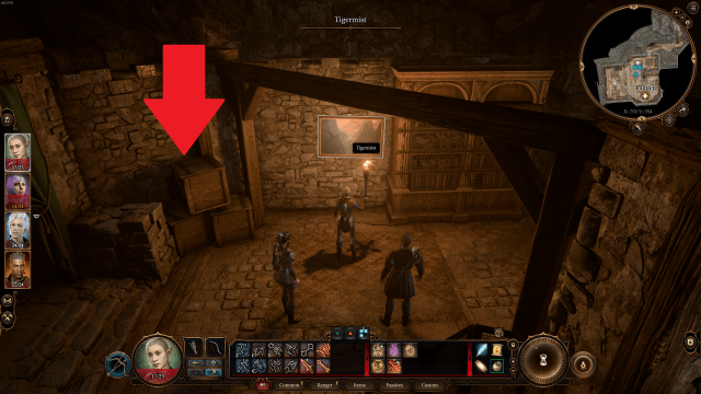 The player character in Baldur's Gate 3 stands in front of a painting with a red arrow pointing to nearby crates.
