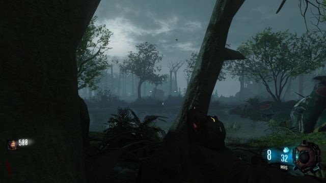 Image showcasing the swamps of Zetsubo No Shima in Black Ops III. A pistol is visible on the screen with a mystifying fog held captive in the background above the waters of the swamps. Trees are lurching into the camera frame.