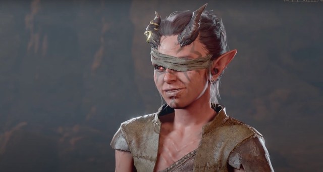 NPC Mol speaking in BG3, with horns and a cover over her left eye.