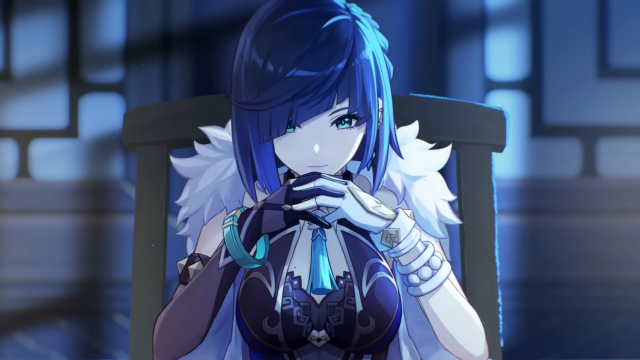 Yelan leaning forward while sitting at a desk with her hands folded and smiling slightly.