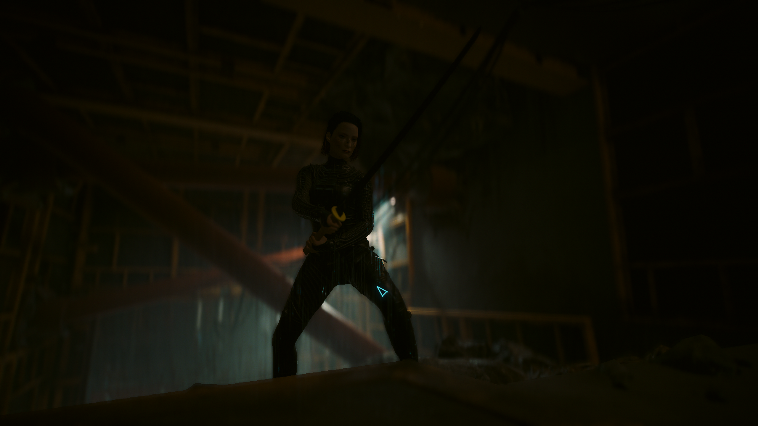 V with a katana equipped underneath Night City in Cyberpunk 2077.