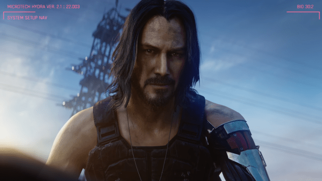 Keanu Reeves' Johnny Silverhand looking at V, who's woken up a wasteland.